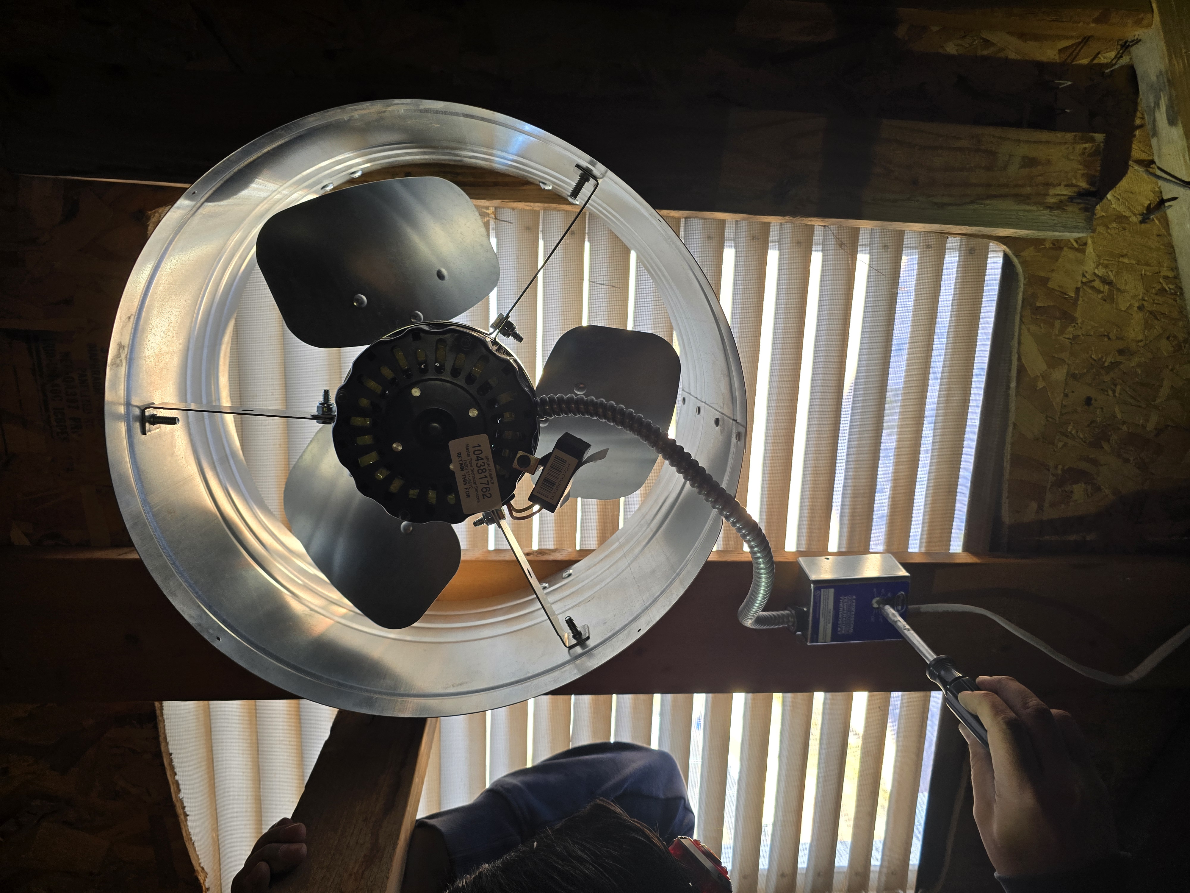 Whole-house attic fan installed as part of an energy efficiency upgrade